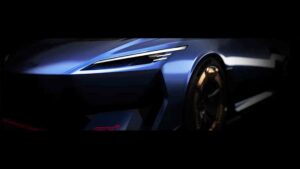 Nærbillede af en futuristisk blå Tesla-bil med skarpe linjer og moderne design