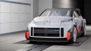 Futuristisk koncept elbil med unikt design i garage