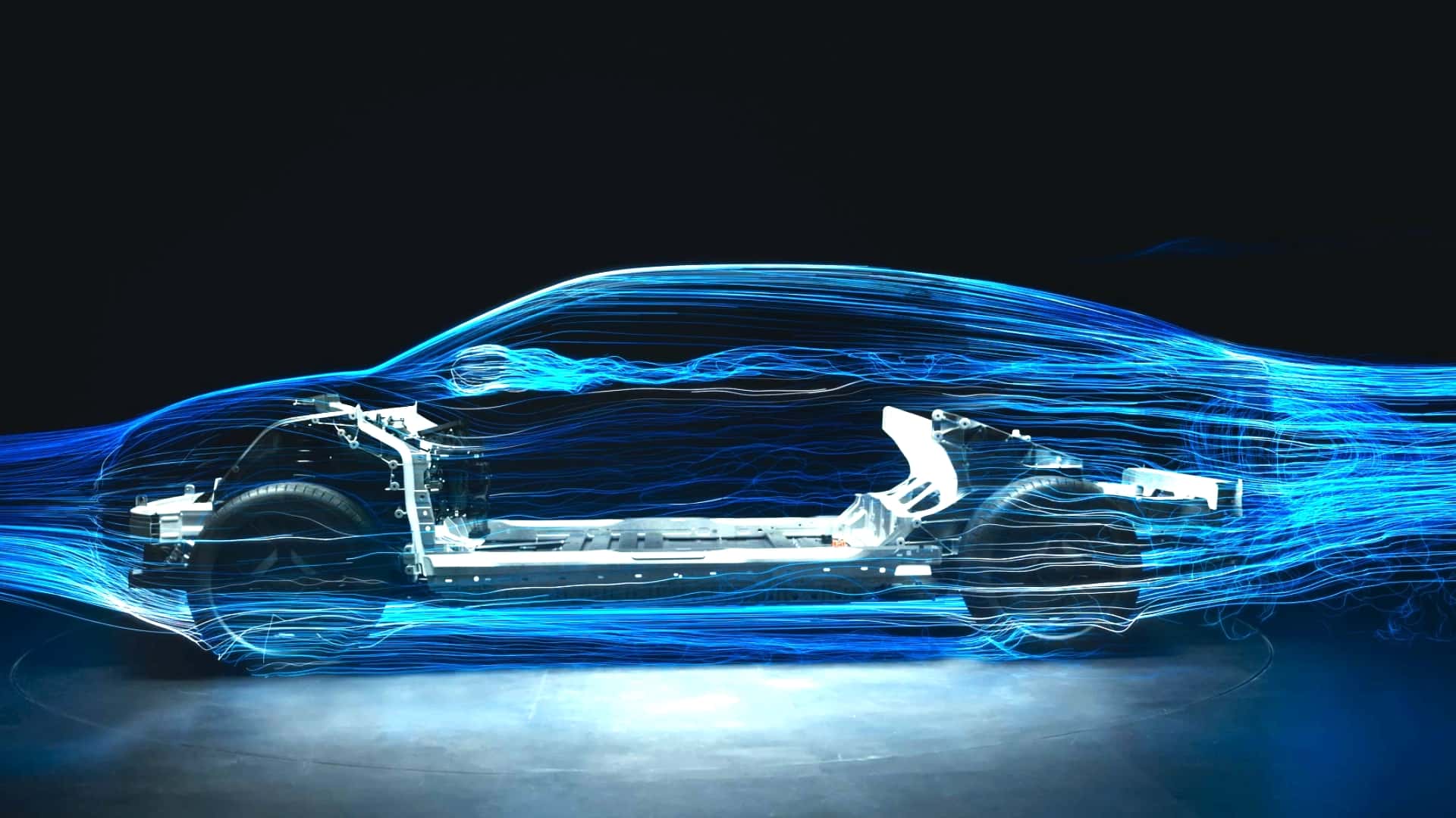 Tesla bilramme med aerodynamiske strømlinjegrafik, der viser effektivitet i design