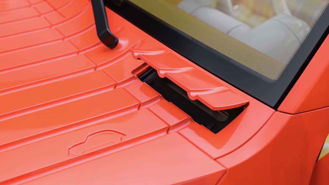 Orange elbil med detaljeret front design
