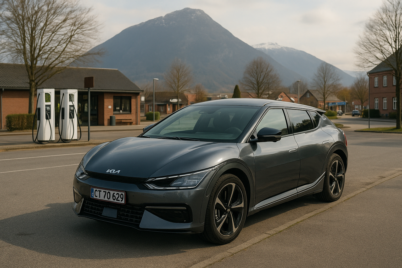 Kia EV6 parkeret foran ladestationer i bymiljø