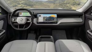 Rivian R1T interiør med digitalt display, landskab udenfor